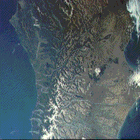Color photograph of the South Island of New Zealand, taken from Skylab.