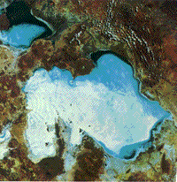 High-altitude aerial photograph of the Salar de Uyuni, Bolivia.