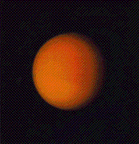 Color-enhanced Voyager image of Titan, a satellite of Saturn with a dense atmosphere.