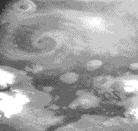 B/W image of spiraling clouds above the martian North Polar region, seen by both the Mariner 10 and Viking Orbiter spacecraft.