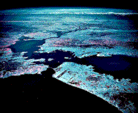Color high-altitude aerial oblique photograph of the San Francisco region.