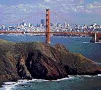 Color photograph of San Francisco looking through the Golden Gate Bridge.
