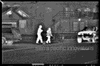 B/W thermal image of a street scene at night.